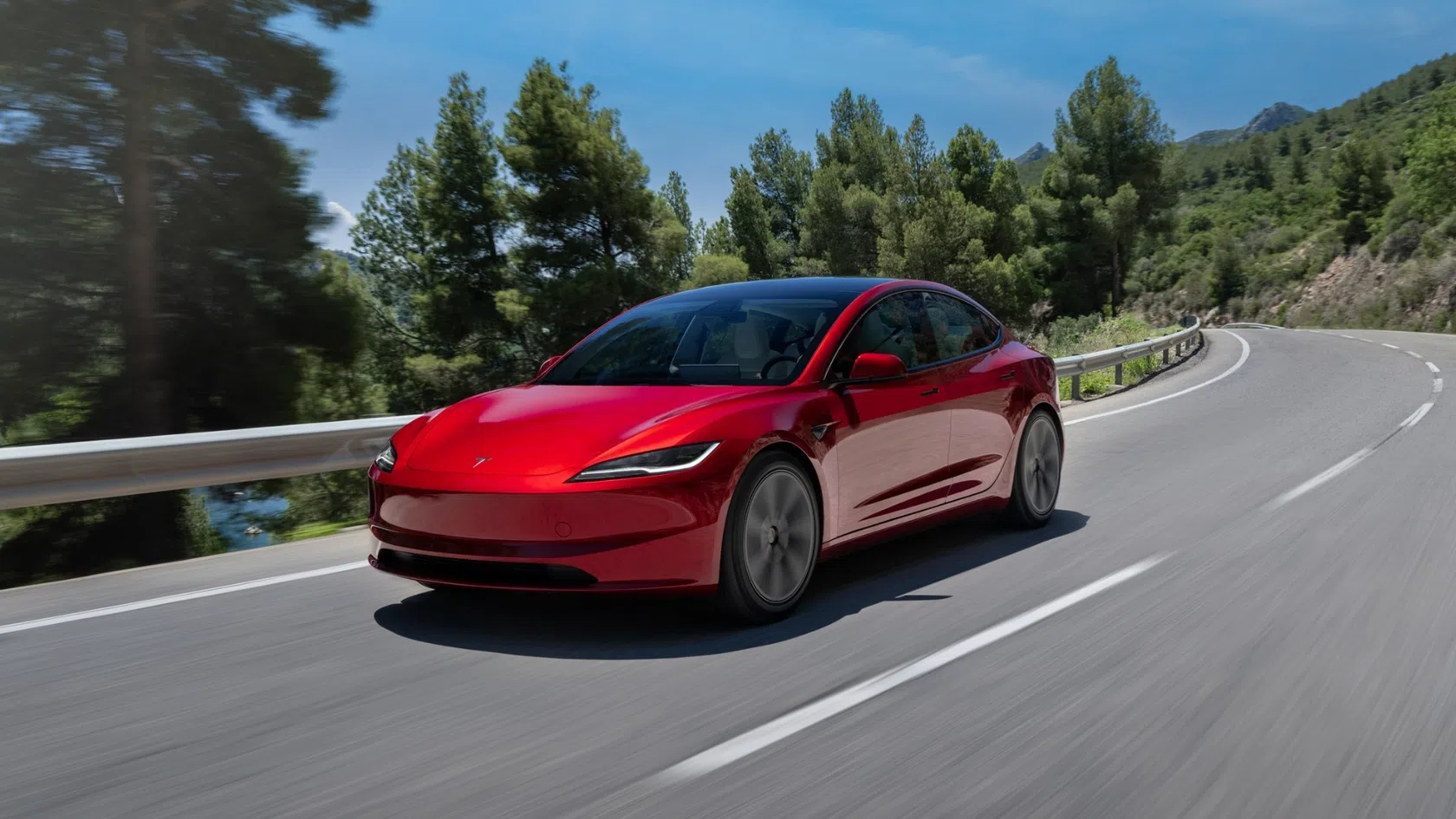 Carro tesla model 3 em vermelho